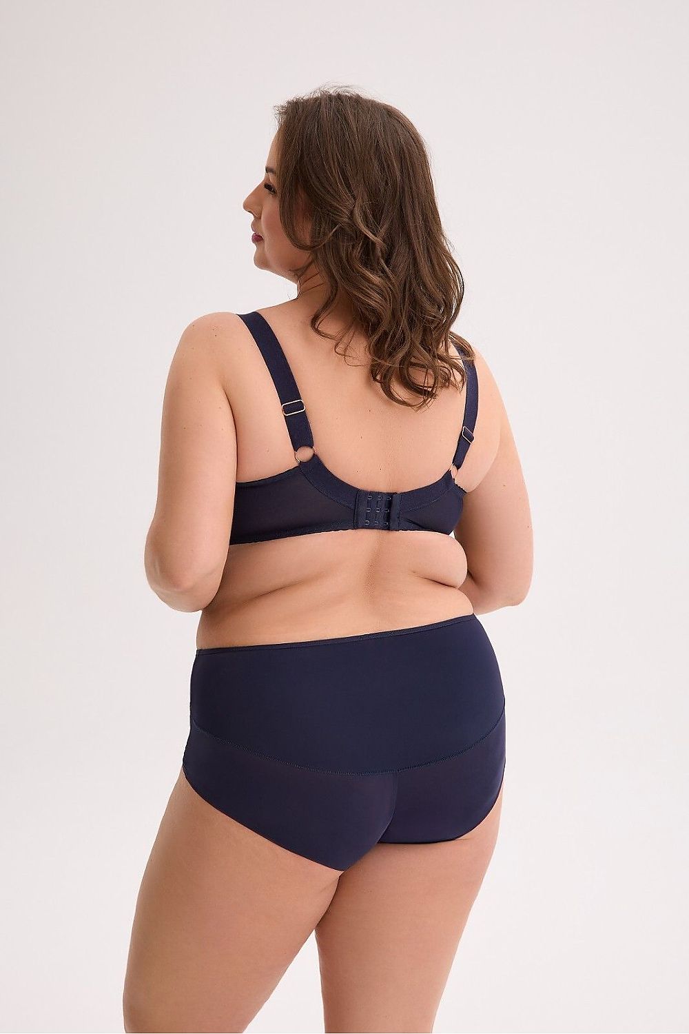 Elegant Gaia semi-soft bra designed for larger breasts, featuring comfortable padded support, available in sizes EU 75-105 and US 34-46. Perfect for all-day wear with breathable cotton lining and stylish detailing.
