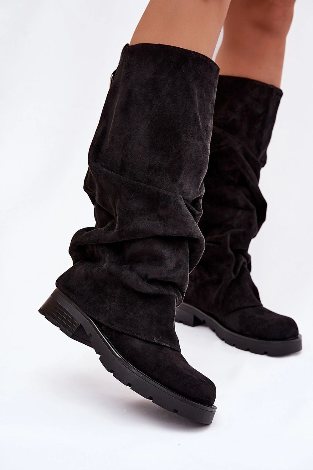 Elegant thigh-high faux suede boots with fleece lining from Step in style, designed for comfort and sophistication, showcasing a fashionable silhouette ideal for pairing with skirts and dresses.