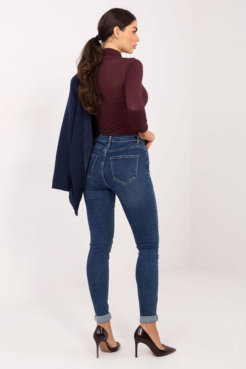 Stylish women's high waist skinny jeans by Factory Price, displaying a flattering slim cut and classic pocket detailing, ideal for everyday elegance.