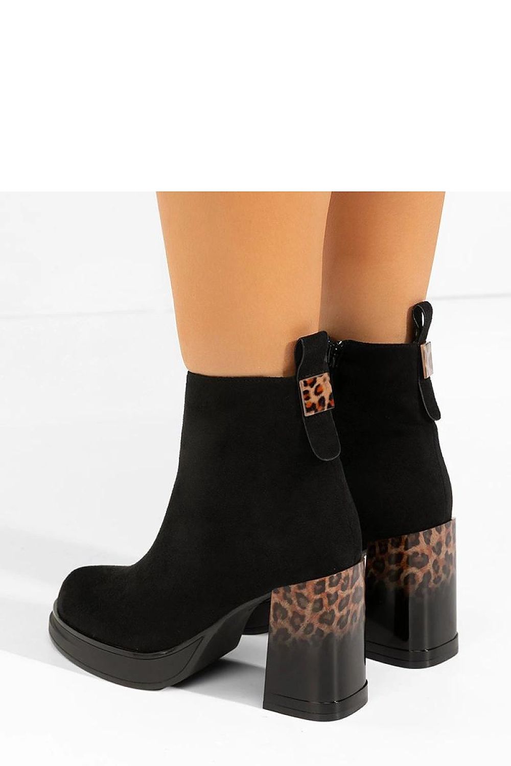 Sophisticated view of Solea Brenna leopard print heel gray ankle boots, showcasing their unique design and versatility for any fashionable occasion.