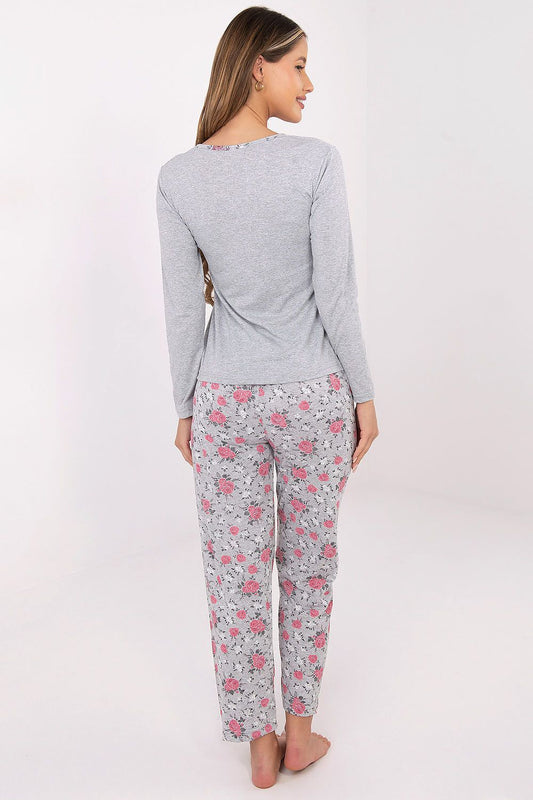 Elegant floral design women's pyjamas set by Forever Pink, featuring a long-sleeved top with decorative buttons and delicate flower print, perfect for luxurious sleepwear.