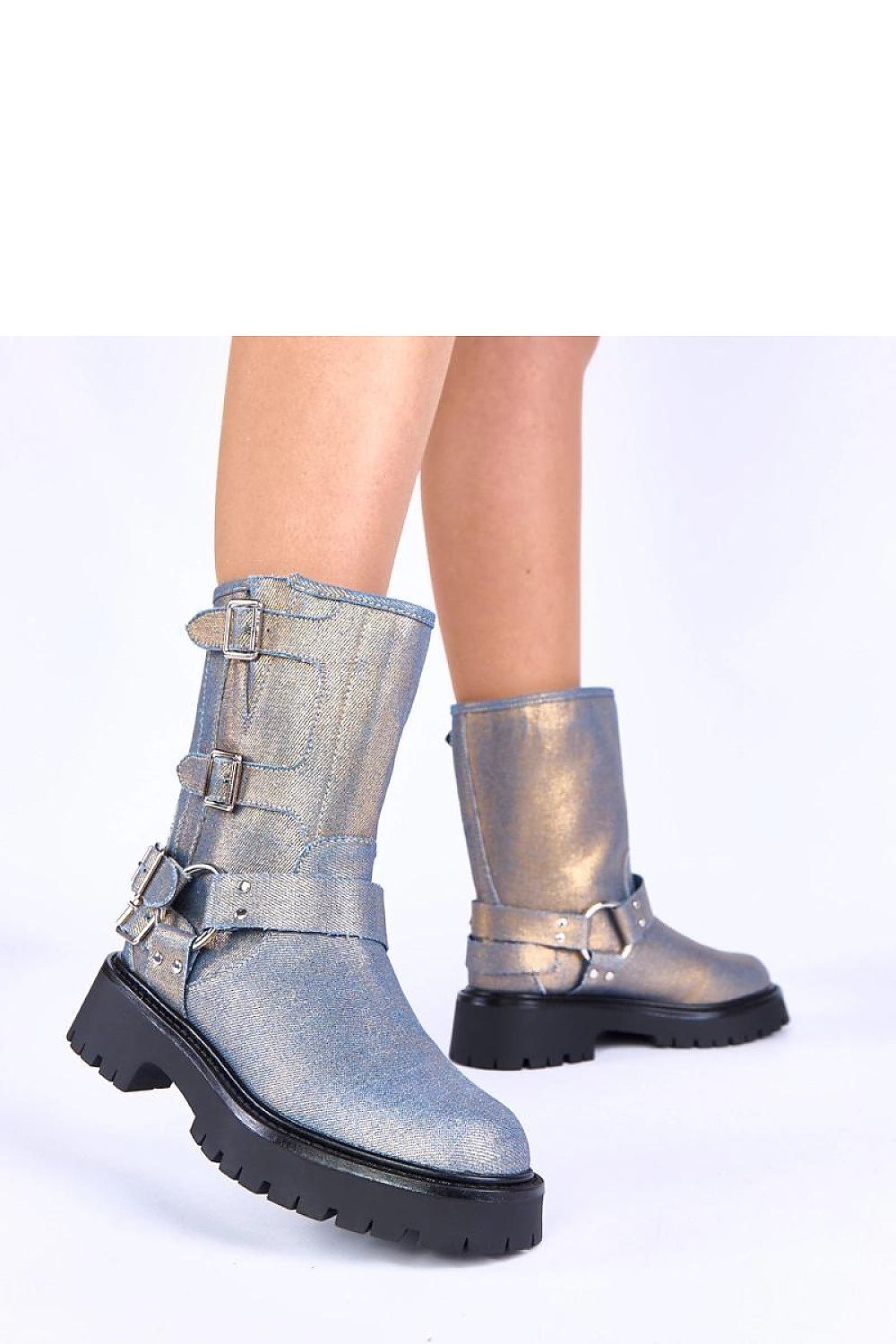 Chic blue women's boots by Solea with decorative gold buckles, perfect for elevating both casual and formal outfits.