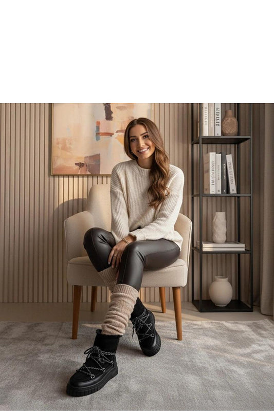 Close-up of Solea Esmee Women's Black Lace-Up Snow Boots, showcasing high-quality materials and luxurious fur lining for optimal warmth.