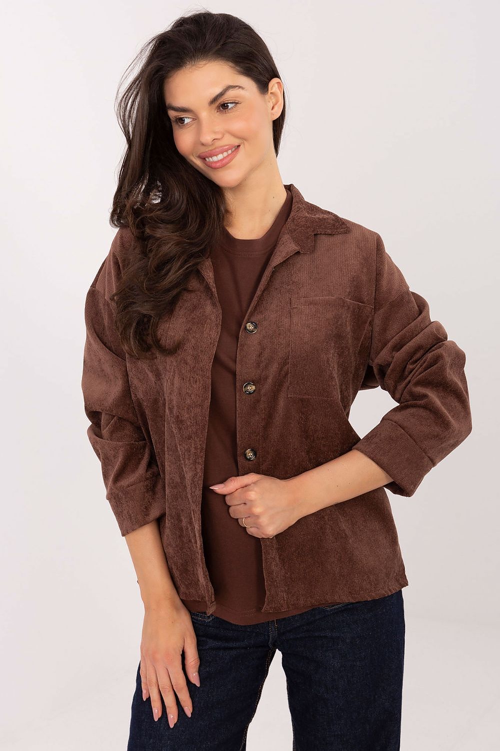 Sublevel Ladies' Corduroy Shirt styled with elegant accessories, emphasizing its versatility and timeless appeal, suitable for various occasions.