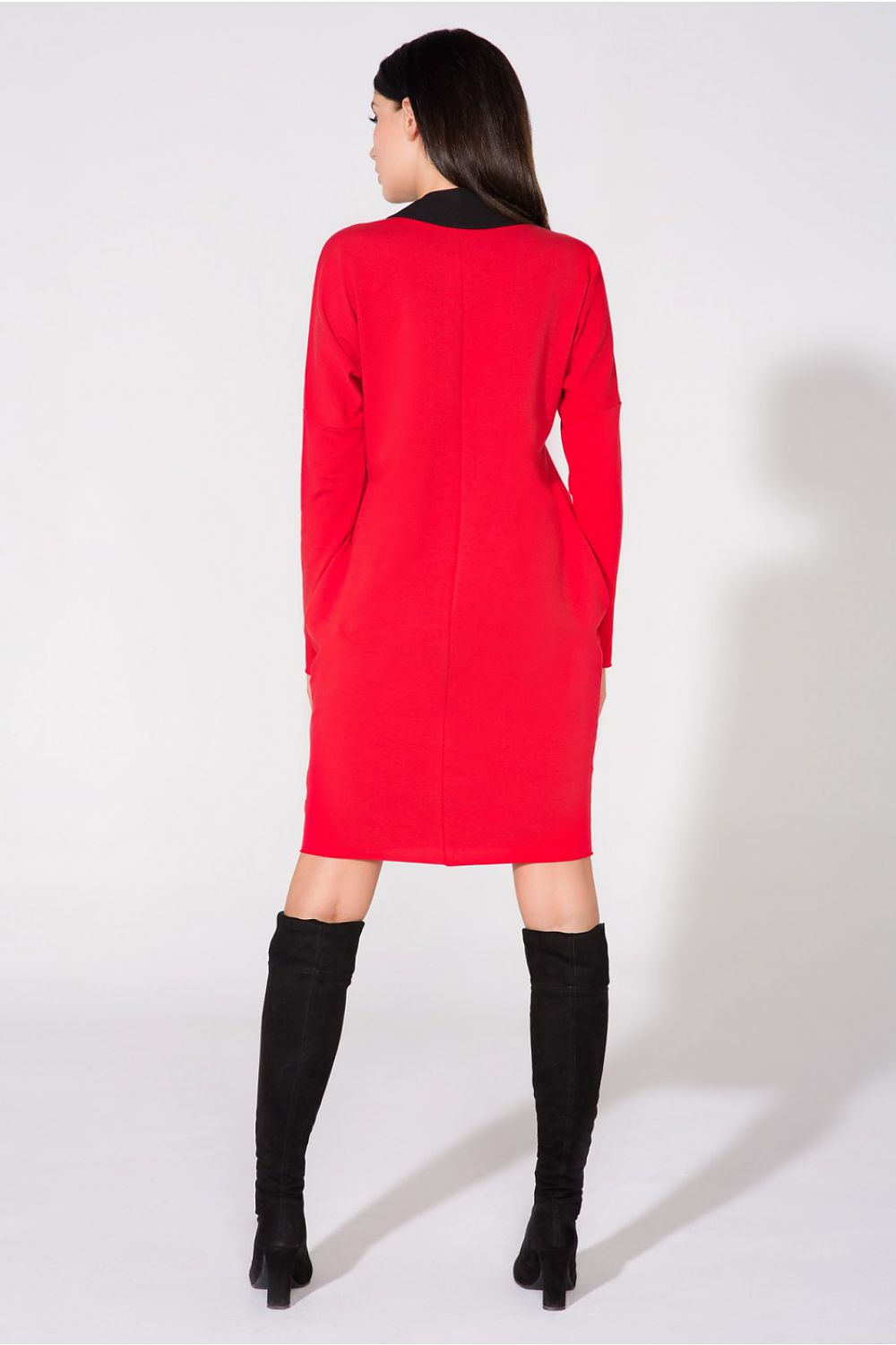 Chic evening dress with pockets and raw edge detail by Tessita, showcasing an elegant cotton blend frock perfect for upscale occasions.