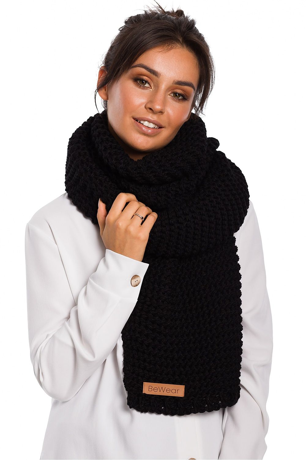 Stylish BE Knit acrylic shawl designed for warmth and elegance, featuring a fashionable logo patch, perfect for winter wear.