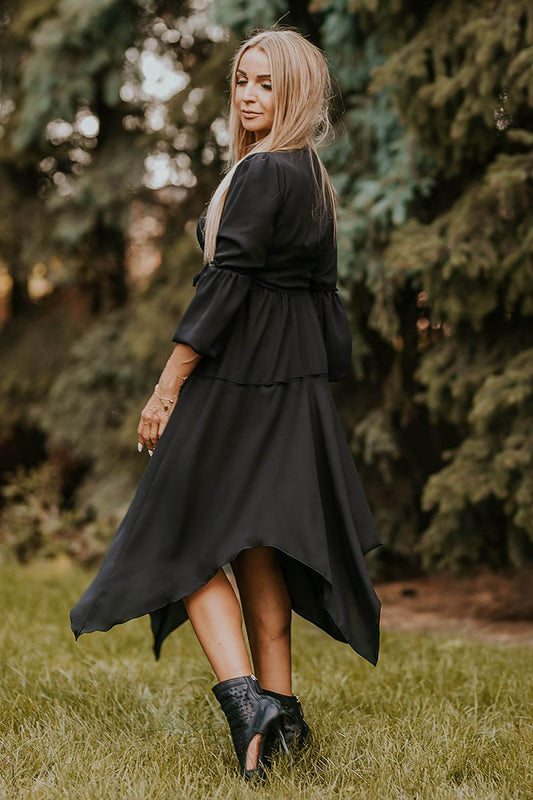 Chic and comfortable daydress featuring a button closure and unique elastic sleeves, designed by Jersa for a sophisticated look.