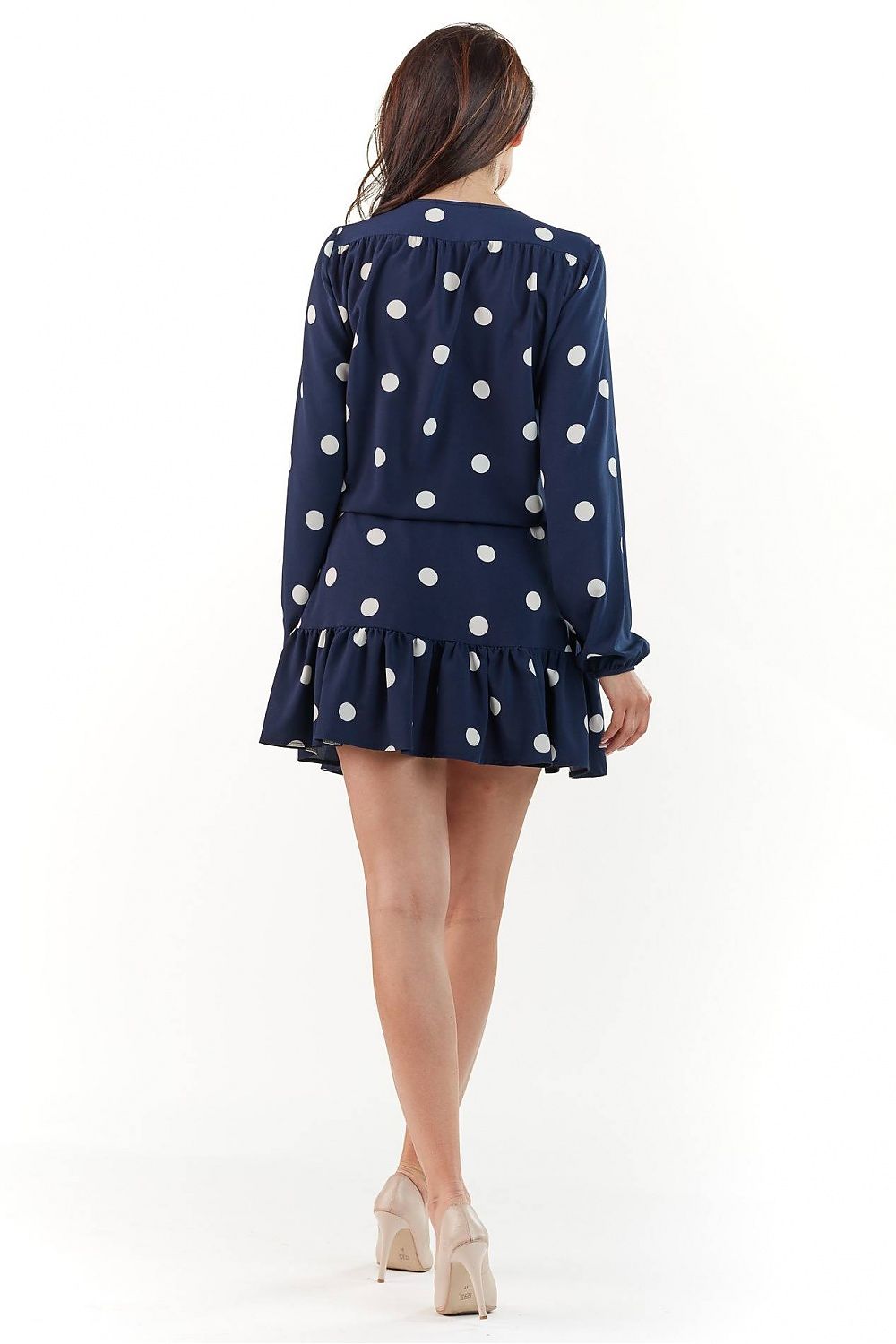 Elegant Polka Dot Cocktail Dress by Infinite You, displayed from the back on a model, highlighting the flowing ruffle detail and elegant navy blue and white polka dot pattern, perfect for any special occasion.