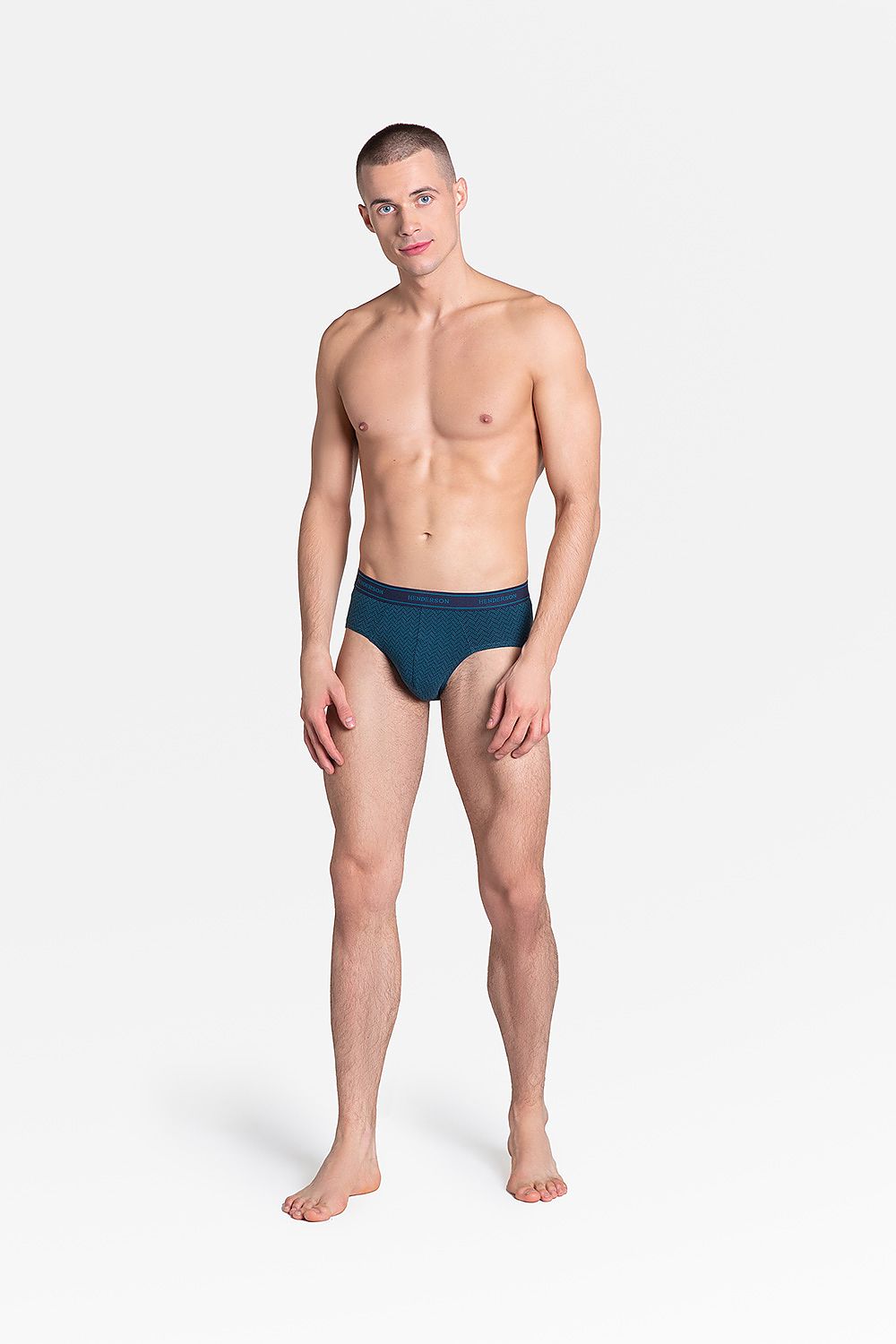 Elegantly showcasing Henderson Premium Men's Briefs - Comfortable Cotton Knit with Unique Mosaic Pattern, this image features a model wearing sophisticated dark cotton knit briefs that embody modern underwear fashion trends.