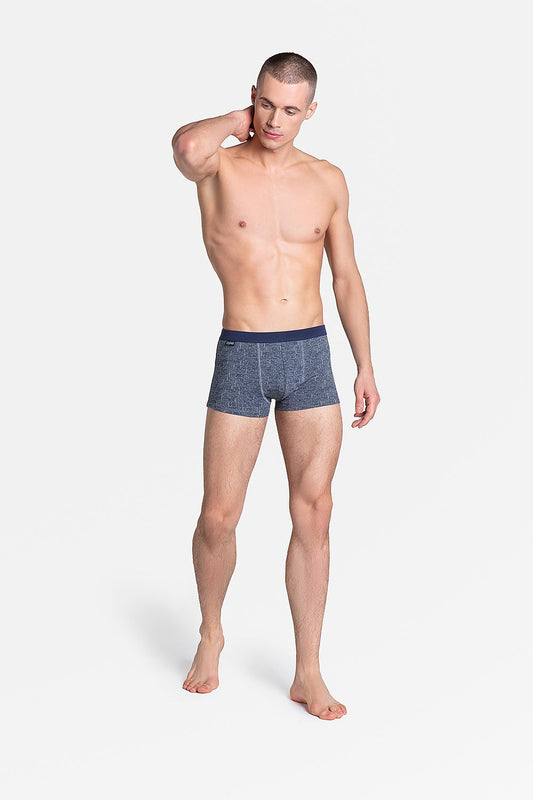 Elegant scene of Henderson Men's Comic Print Boxers, epitomizing comfort in soft cotton stretch, modeled by a stylish individual posing gracefully.