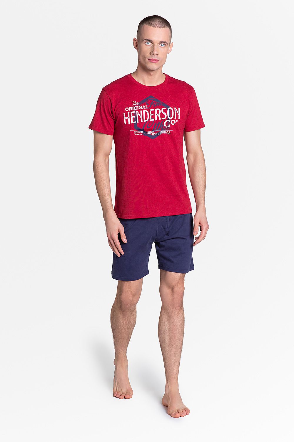 Henderson Lars Red and Navy Two-Piece Pyjama Set showcasing a luxurious red top with a bold graphic design, paired with sophisticated navy shorts, perfect for a relaxing evening.