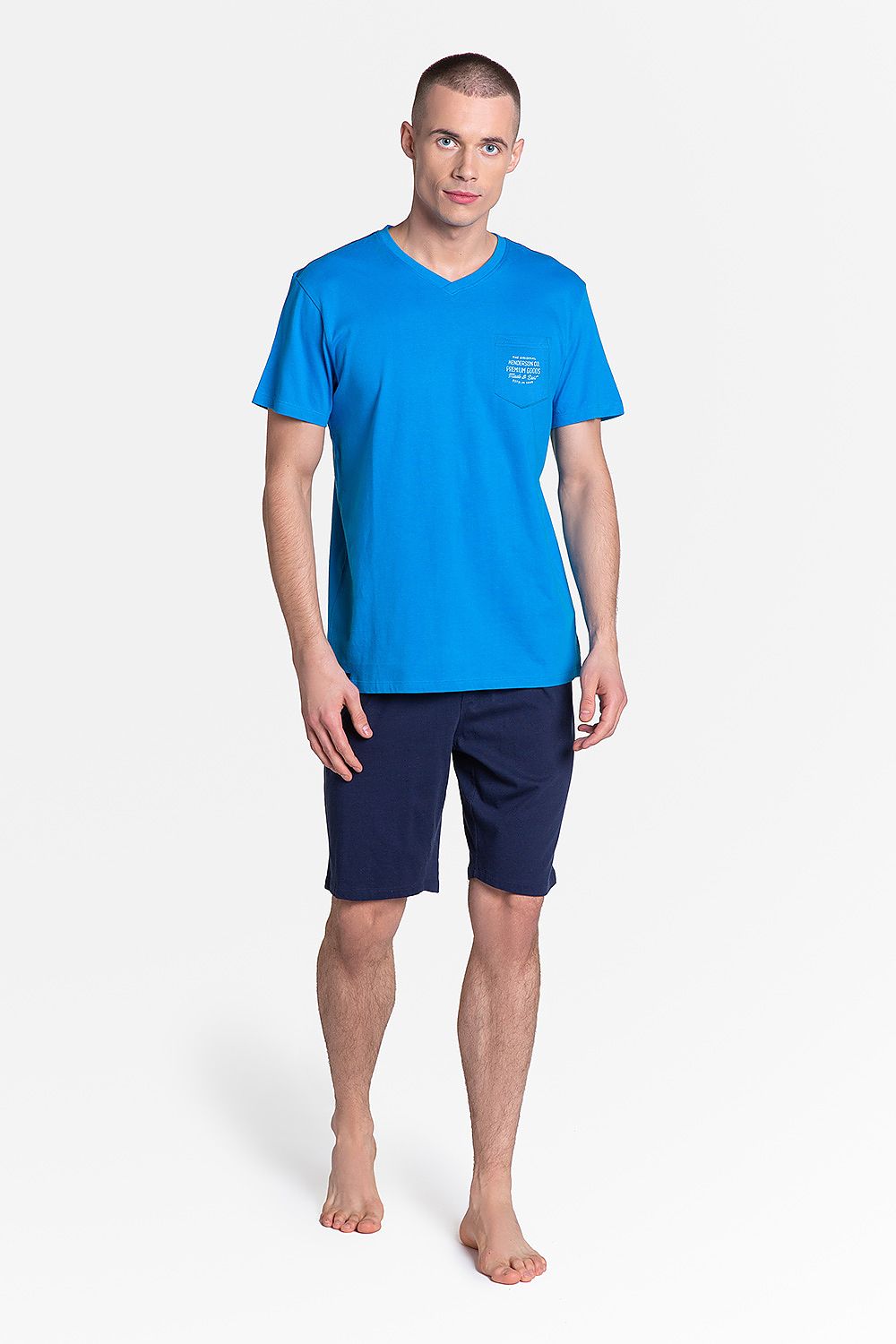 Henderson Dodge 2-Piece Men’s Cotton Pyjamas Set featuring a stylish blue T-shirt and navy knee-length shorts, reflecting a classic sporty design for ultimate comfort.