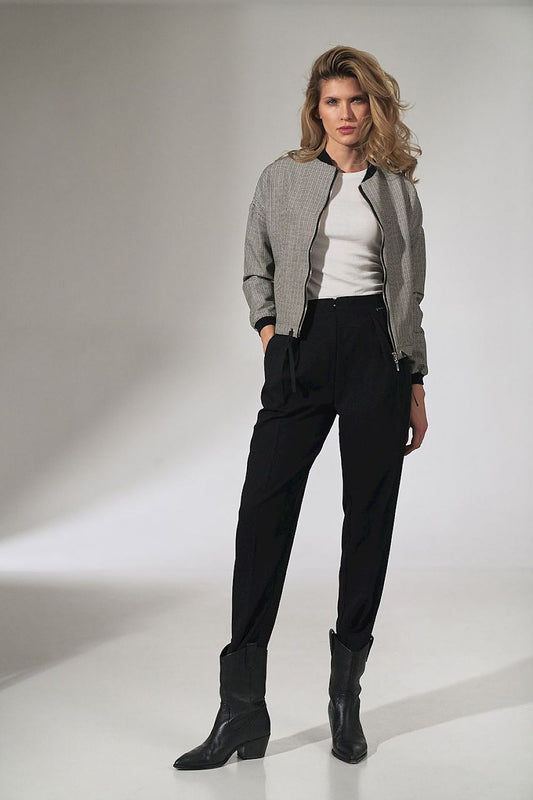 A sophisticated image of a model in the Stylish Checked Bomber Jacket by Figl, highlighting its versatile design with a zip fastening and chic ribbed details, paired with tailored trousers.