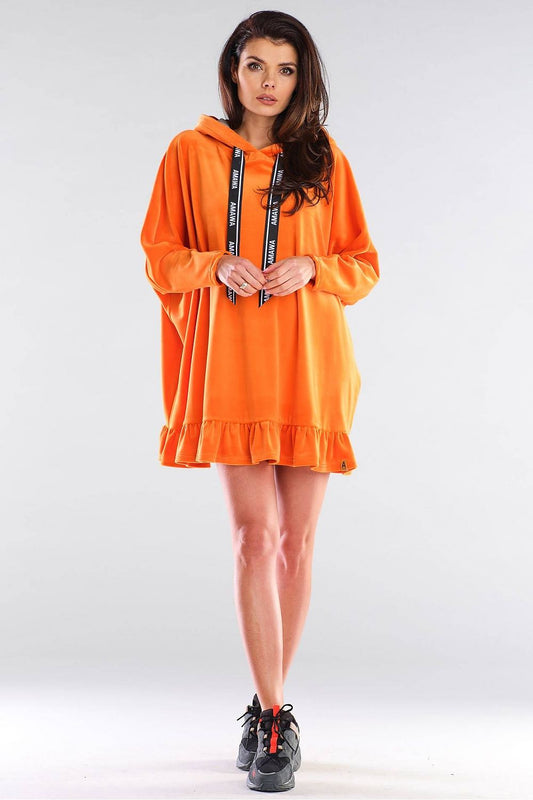Sophisticated oversized Daydress Awama showcased in bright orange, designed with a fashionable hood and flounce details. Perfect for a relaxed yet stylish look, embodying modern luxury.
