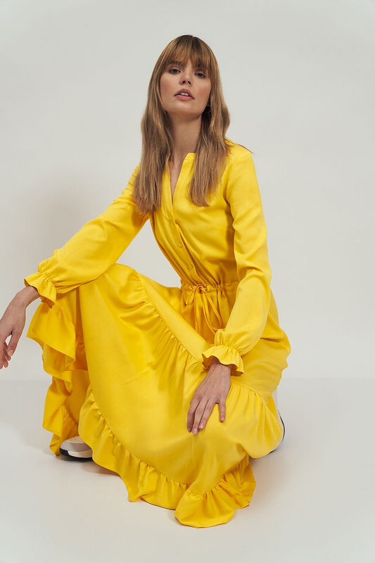 Chic representation of the Daydress Nife in radiant yellow, showcasing a comfortable fit with a flowing silhouette and intricate frill detailing, ideal for a sophisticated yet relaxed look.