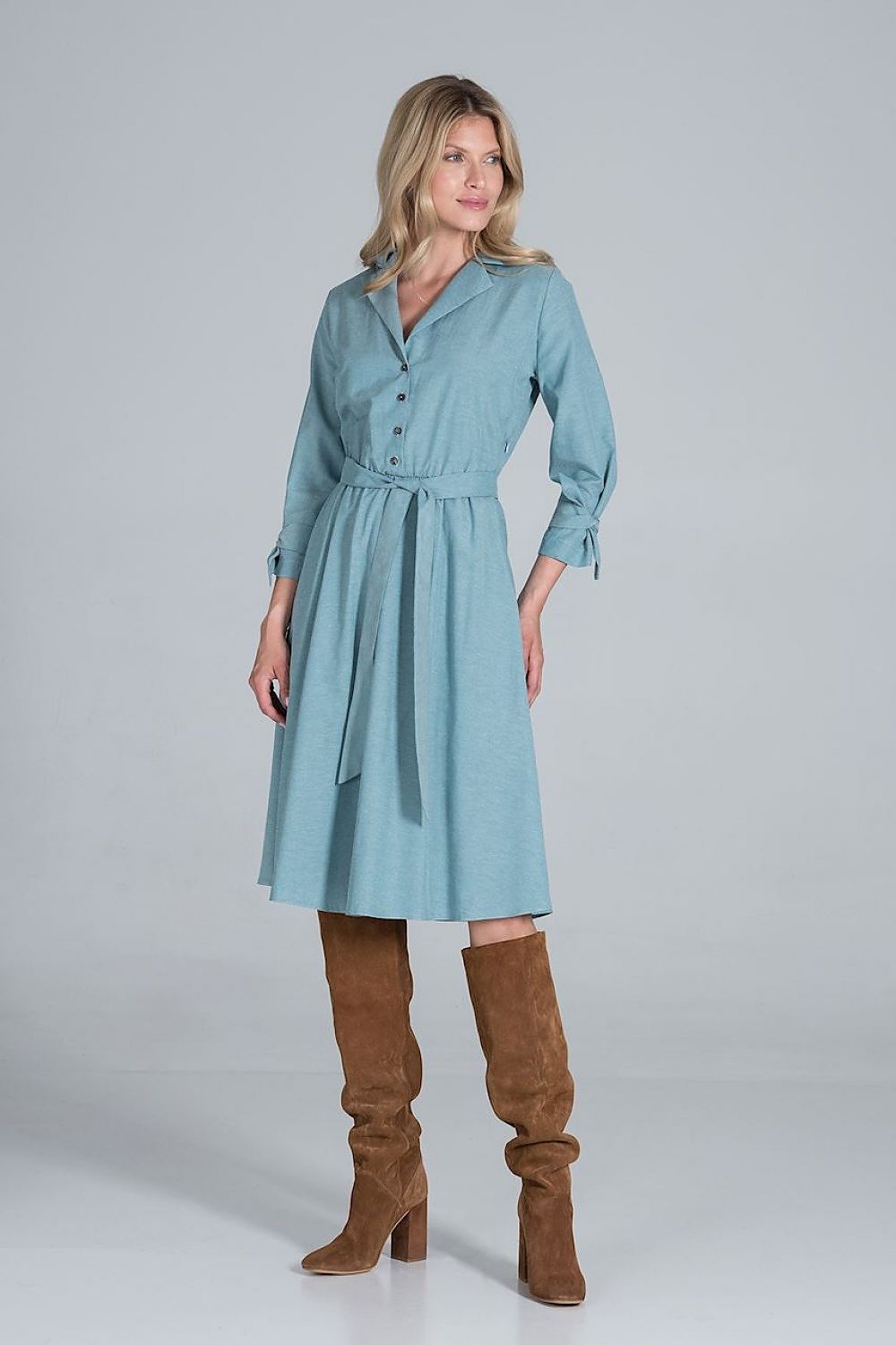 Elegant Midi Dress by Figl with Jacket-Style V-Neck, Flared Hem & Tie Belt, displayed on a model in a stunning pose, showcasing the sophisticated ensemble with stylish knee-high boots.