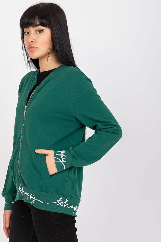 Luxury Ladies' Zipper Sweatshirt With Ribbed Cuffs & Slip-On Pockets - Cotton Blend, side view of a model in a green sweatshirt highlighting the fashionable design and slip-on pockets, ideal for both comfort and style.