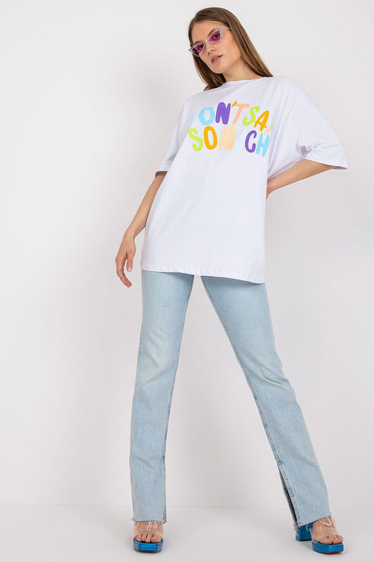 Chic Loose-Fit Ladies' T-Shirt featuring Decorative Front Wording, elegant model posing in a stylish outfit paired with flared jeans, designed for a luxurious casual look.