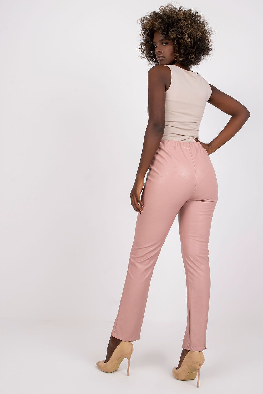 Luxury Women's High Rise Eco-Leather Trousers with Slits by Italy Moda, displayed from the back on a model, highlighting the sleek design and flattering silhouette, ideal for chic and trendy outfits.