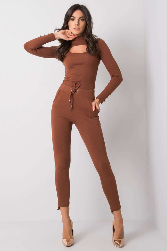 BFG Luxury Tapered Sweatpants with Adjustable Waist and Side Pockets - Stylish Cotton Blend, worn by a model accentuating the tied waist and tapered legs in a stylish brown outfit.