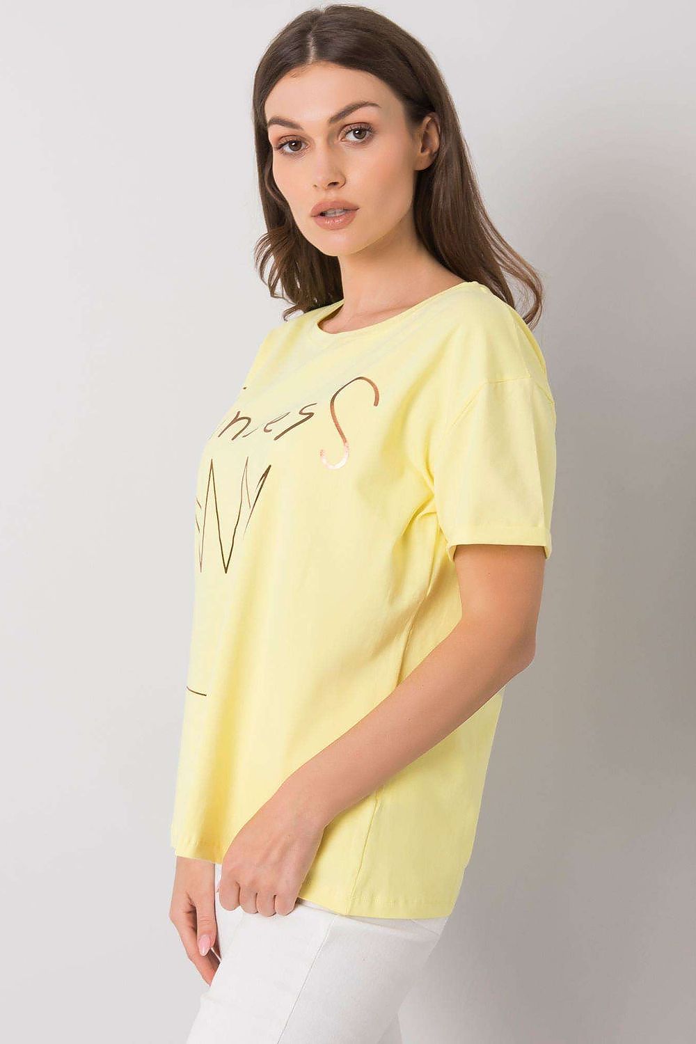 Side view of the Elegant Ladies' Short Sleeve T-Shirt with Decorative Print in yellow, displaying the fashionable 'Princess' print, designed with 95% Cotton and 5% Lycra, ideal for a chic look.