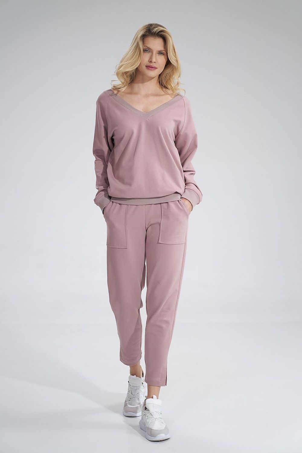 Luxury Cotton V-Neck Sweatshirt with Decorative Ribbon - Figl Blouse. Model presenting this chic sweatshirt outfit, combining comfort and elegance effortlessly.