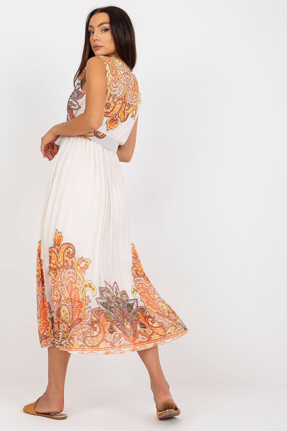 Elegant Summer Flared Sleeveless Dress with Envelope Neckline and Pleated Bottom by Italy Moda, highlighting the back design and pleated fabric, perfect for luxury summer outings.