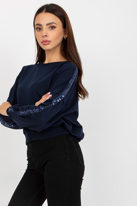 Luxury Rue Paris Women's Sequined Long Sleeve Sweatshirt with Round Neckline - Elegant Comfort, showcasing a model in navy sweatshirt with sequined accents, perfect for chic casual wear.