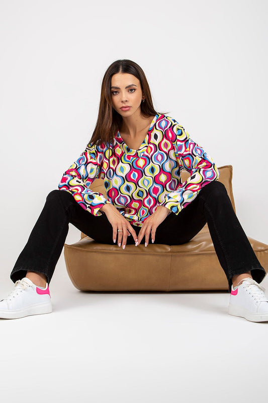 Luxurious Women's Sweatshirt with Heart Neckline and Unique Pattern by Rue Paris, model in a stylish pose sitting on a modern chair, emphasising comfort and trendy pattern.