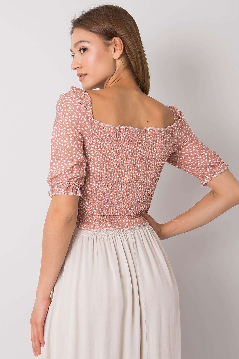 Back view of the Rue Paris Fitted Cotton Spandex Blouse with V-Neck and Short Sleeves, demonstrating its sophisticated ruched detailing and flattering cut.