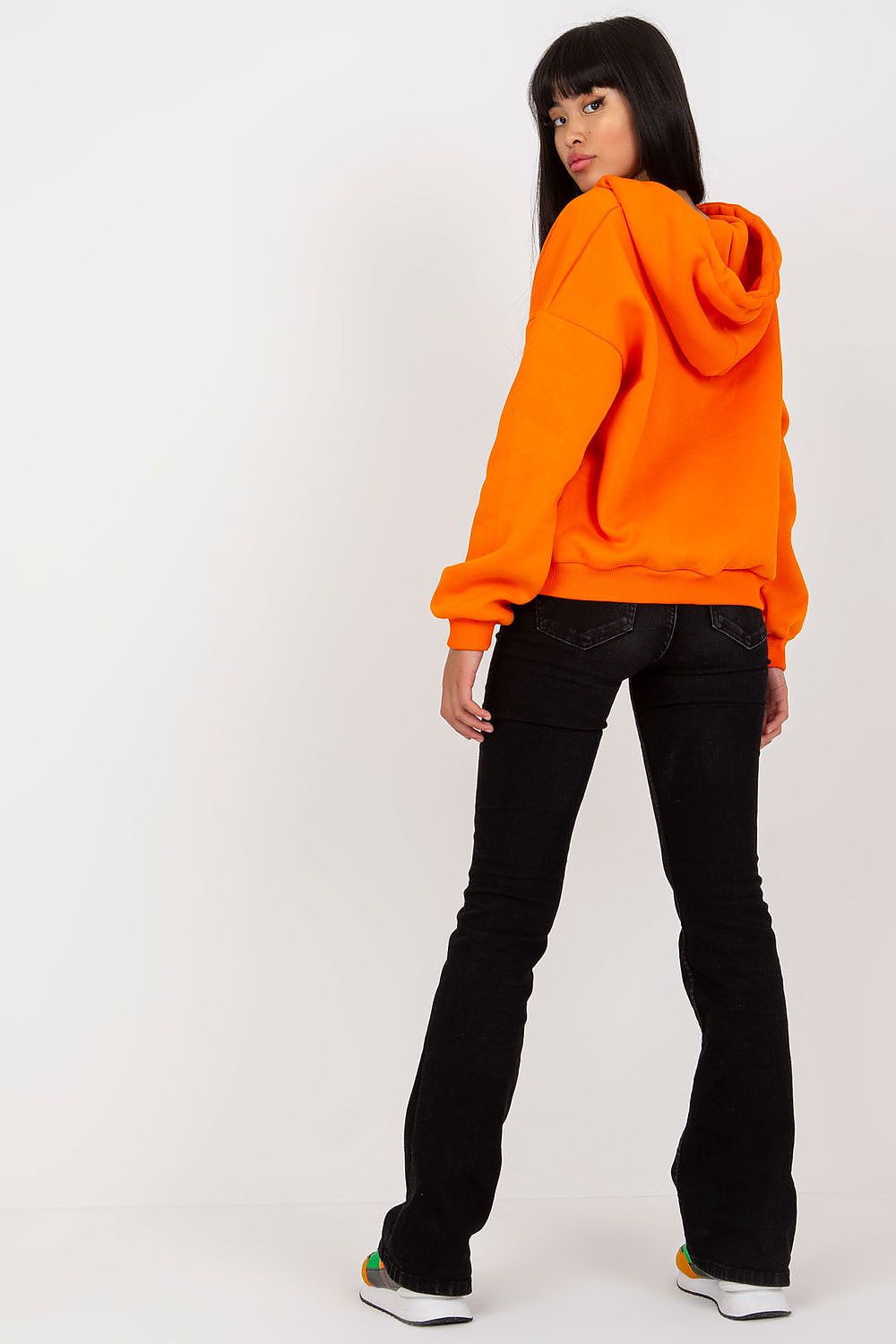Luxury Women's V-Neck Sweatshirt With Hood - Premium Cotton Blend By BFG, model showcasing the back view of a bright orange sweatshirt, perfect for chic leisure wear.