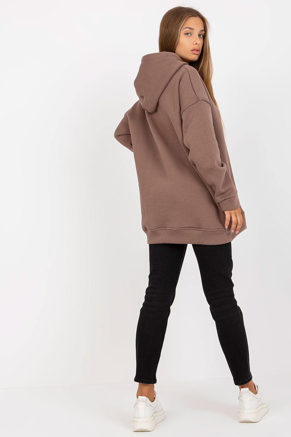 Back view of the model wearing the Luxury BFG Extended Cut Sweatshirt with Hood and Slip Pockets, emphasizing the sweatshirt's luxurious design and soft material composition.