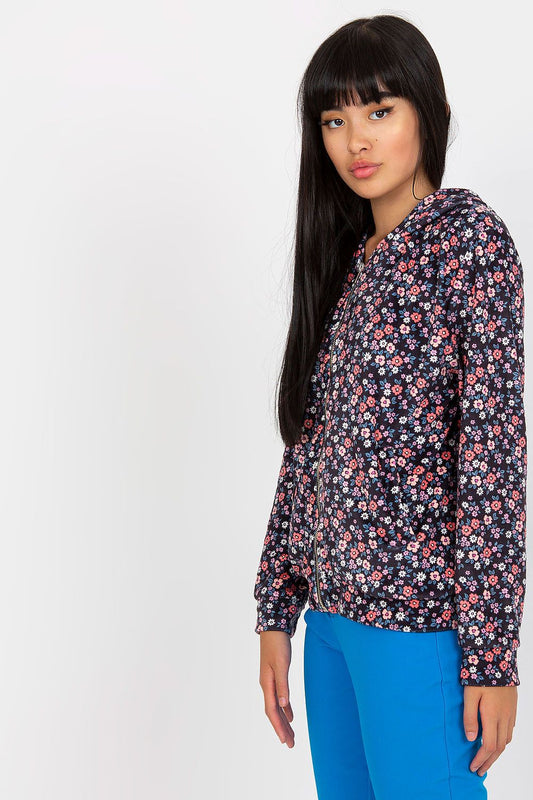 Luxury Women's Long-Sleeved Zip-Up Sweatshirt by Rue Paris displayed on a model, showcasing the stylish floral print and side pockets, perfect for sophisticated casual wear.