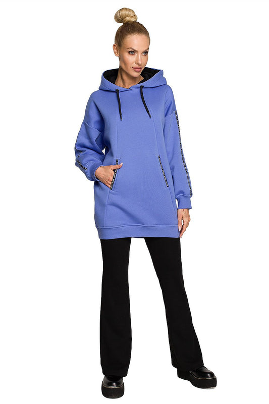 Elegantly modelled Moe Luxury Fleece-Lined Sweatshirt Tunic in blue, showcasing a modern silhouette with functional pockets, ideal for a sophisticated casual look.