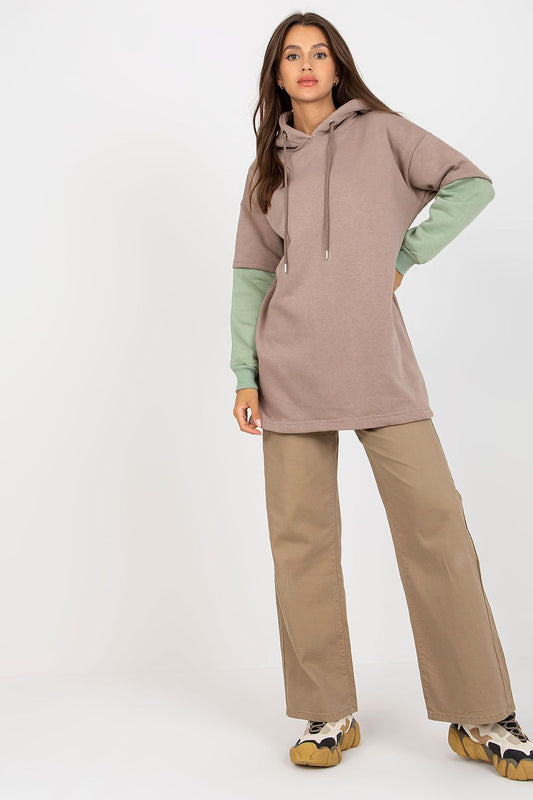 Luxury Women's Rue Paris Cotton Blend Sweatshirt with Hood, Extended Cut and Long Sleeves - Fashionable model showcasing the comfortable and elegant hoodie in a relaxed stance.