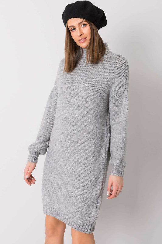 Elegant Rue Paris Sweater Dress with Long Sleeves and Half Turtleneck showcased by a model wearing a black beret, perfect for versatile style for any occasion.