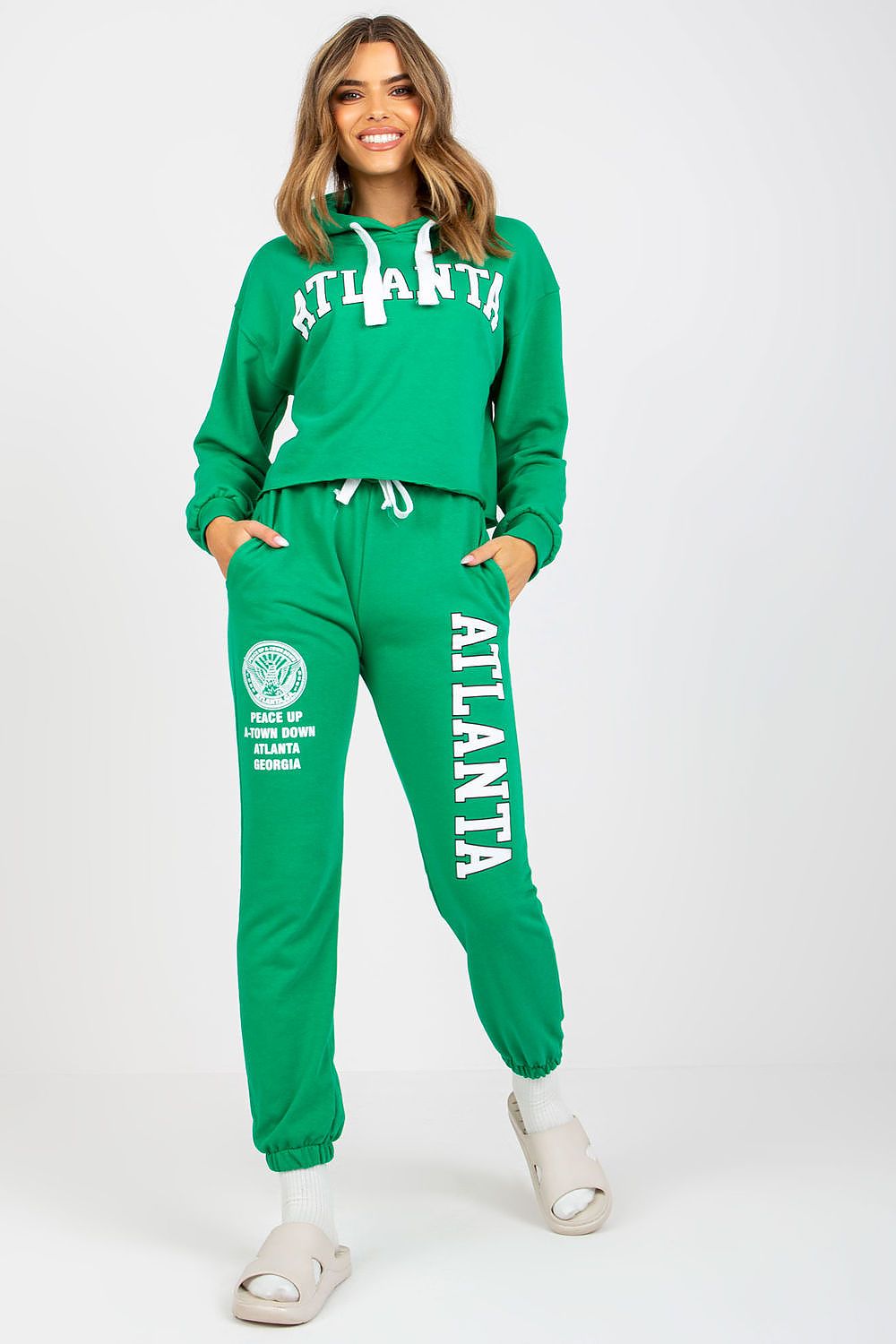 Luxury Ex Moda Sweatshirt Set With Hooded Long Sleeve Top And High Waist Pants in green, featuring a model smiling while showcasing the trendy outfit with elegant details.