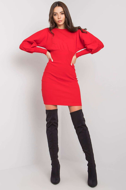 Elegant red fitted daydress by Rue Paris with long sleeves, styled with thigh-high black boots.