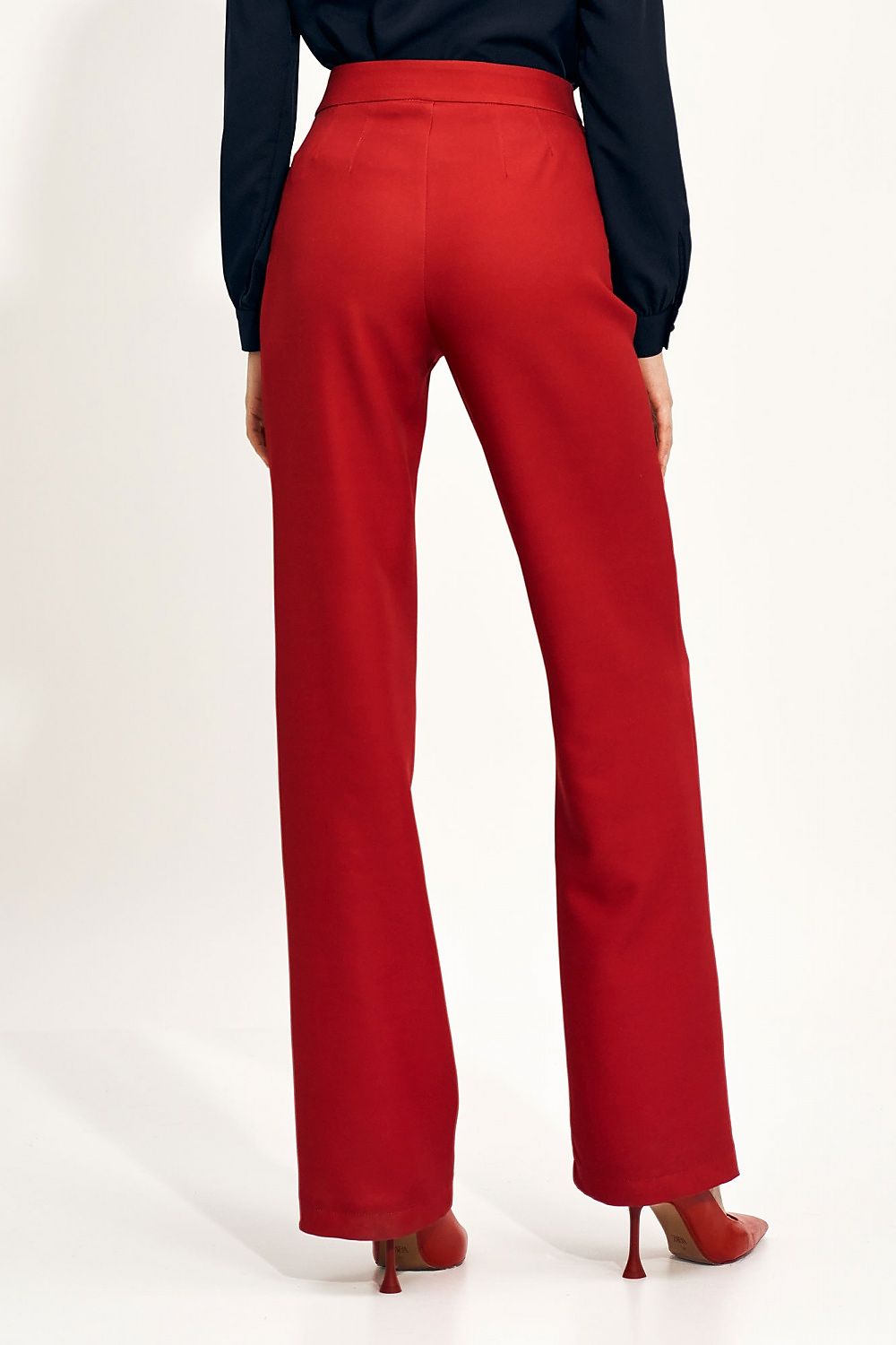 Elegant high-rise red wide leg trousers styled with a fitted top, exhibiting a fashionable back perspective, ideal for creating a chic office or casual ensemble.