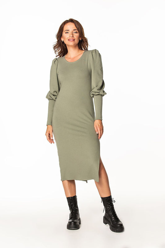 Stunning view of the Tessita knitted midi dress on a model showcasing stylish long cuffed sleeves and a flattering silhouette.
