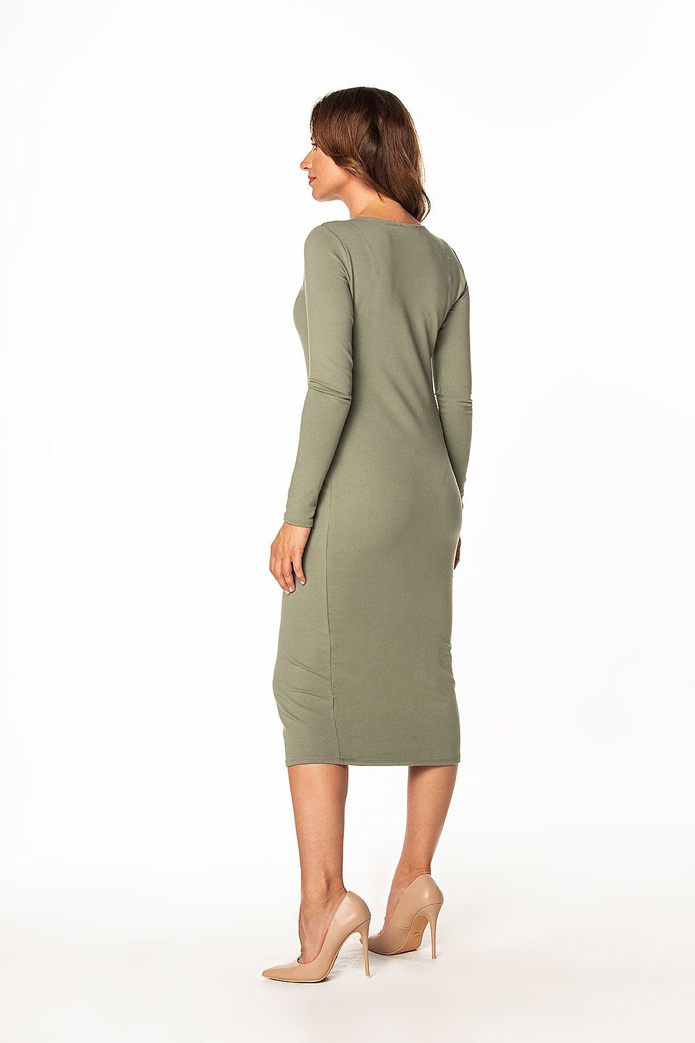 Elegant Tessita long fitted cotton knit dress showcasing a stylish boat neckline and long sleeves. The dress is displayed from the back in a versatile olive green, accentuated by chic nude high heels, perfect for a sophisticated evening look.