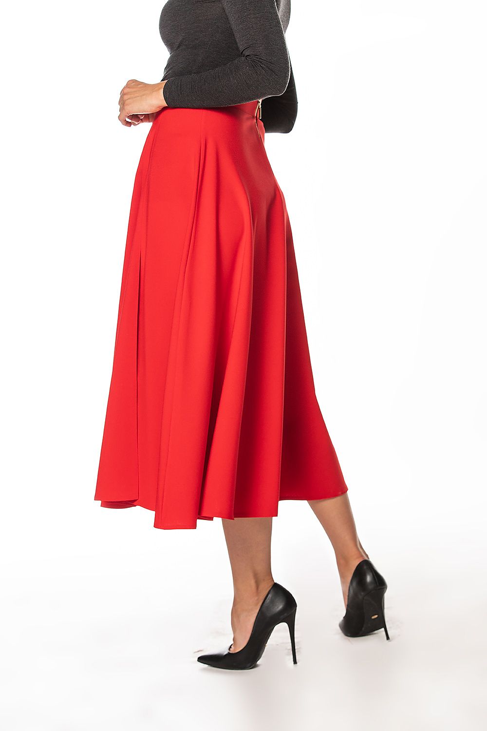 Tessita's stylish mid-calf skirt with a graceful side slit, elegantly tailored for a refined look suitable for any occasion.