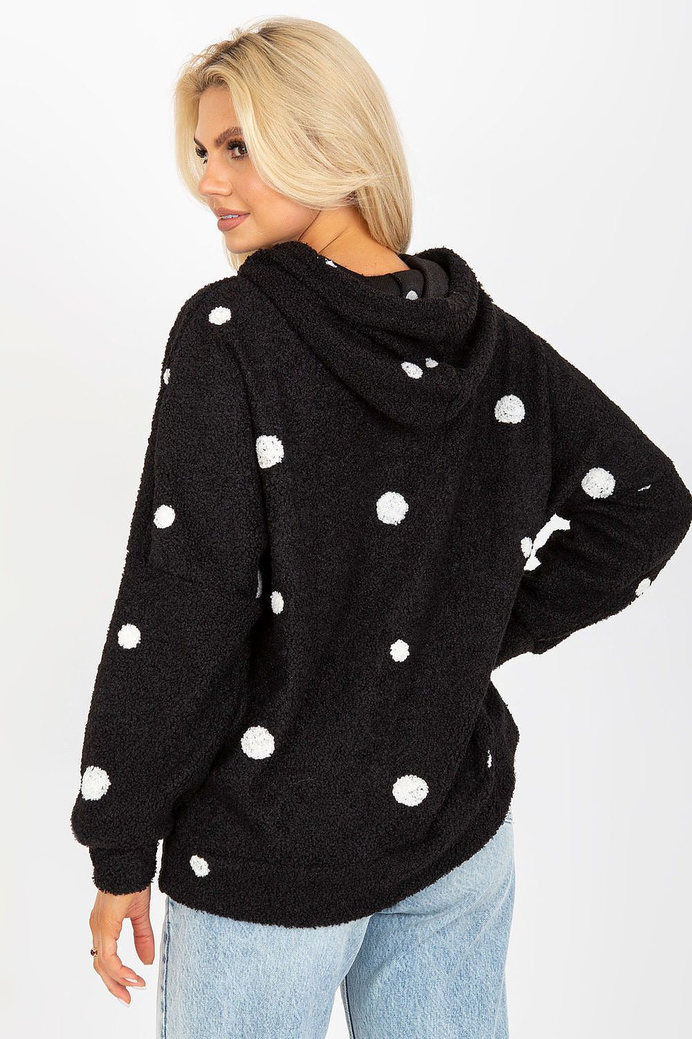 Elegant women's long-sleeved cotton-spandex sweatshirt in black with stylish white polka dots, featuring a cosy hood and slip pockets, showcasing a chic back view.