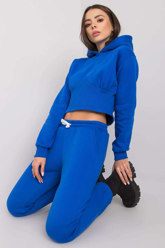 Intimate view of the Ex Moda luxurious blue sweatshirt set with a cropped hooded sweatshirt and long pants, showcasing a trendy and casual look.
