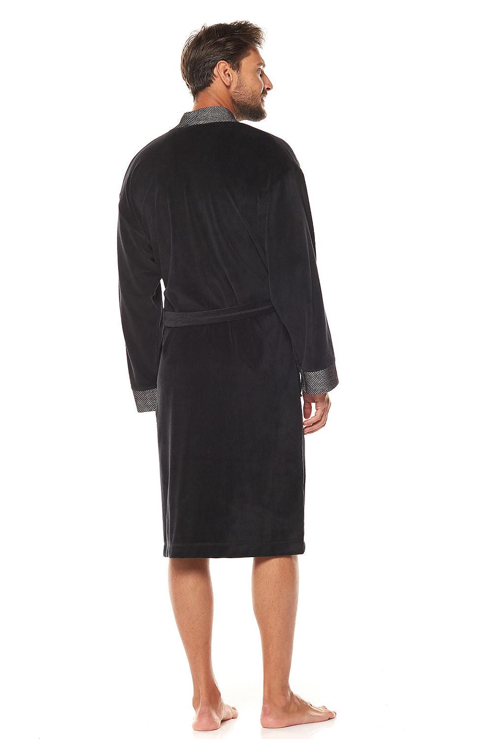 Back view of a premium men's black velour bathrobe showcasing the sophisticated shawl collar and stylish knit accents.