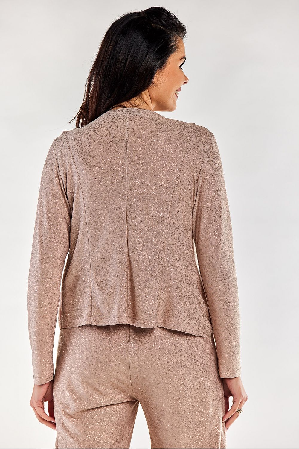 Elegant loose-fitting long-sleeved bedspread jacket in a soft beige hue, showcasing a smooth back design, perfect for adding a touch of luxury to your loungewear collection. Crafted in Poland, this stylish jacket combines comfort and sophistication.
