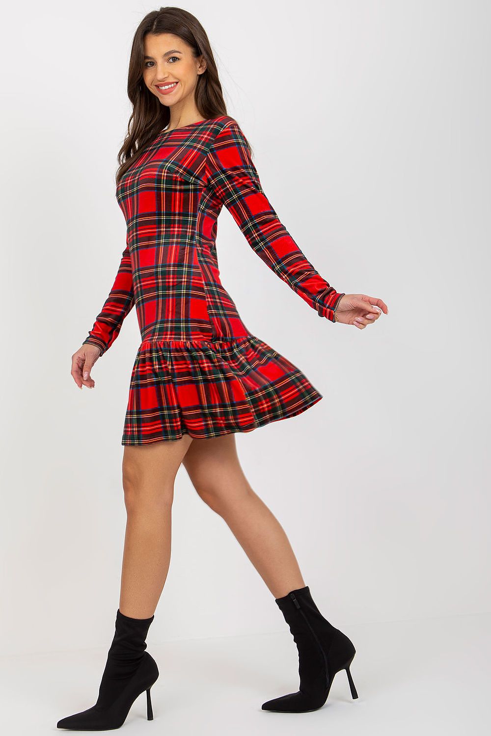 Sophisticated checkered velour daydress in a vibrant red pattern, highlighted by a model demonstrating its flattering silhouette and luxurious style.