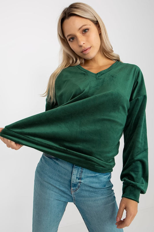 Chic women's velour sweatshirt in rich green, showcasing a relaxed fit and heart neckline, ideal for a casual yet luxurious look.