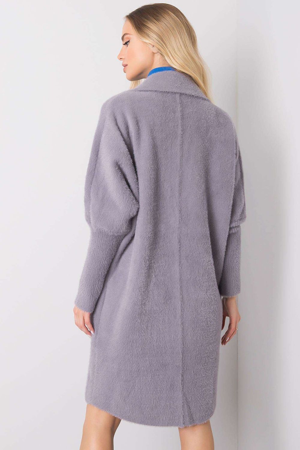 Elegant women's Angora wool blend coat in soft grey, showcasing a chic long-sleeve design and relaxed silhouette. The coat features a stylish collar and is unlined, perfect for layering. Ideal for sophisticated autumn and winter looks.