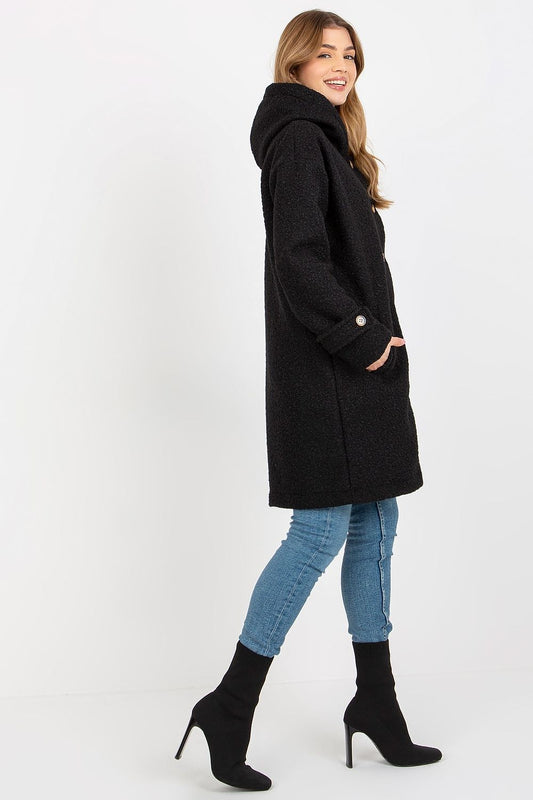 Elegant black plush coat featuring a hood and button details, model styled in a side view to highlight its chic silhouette.